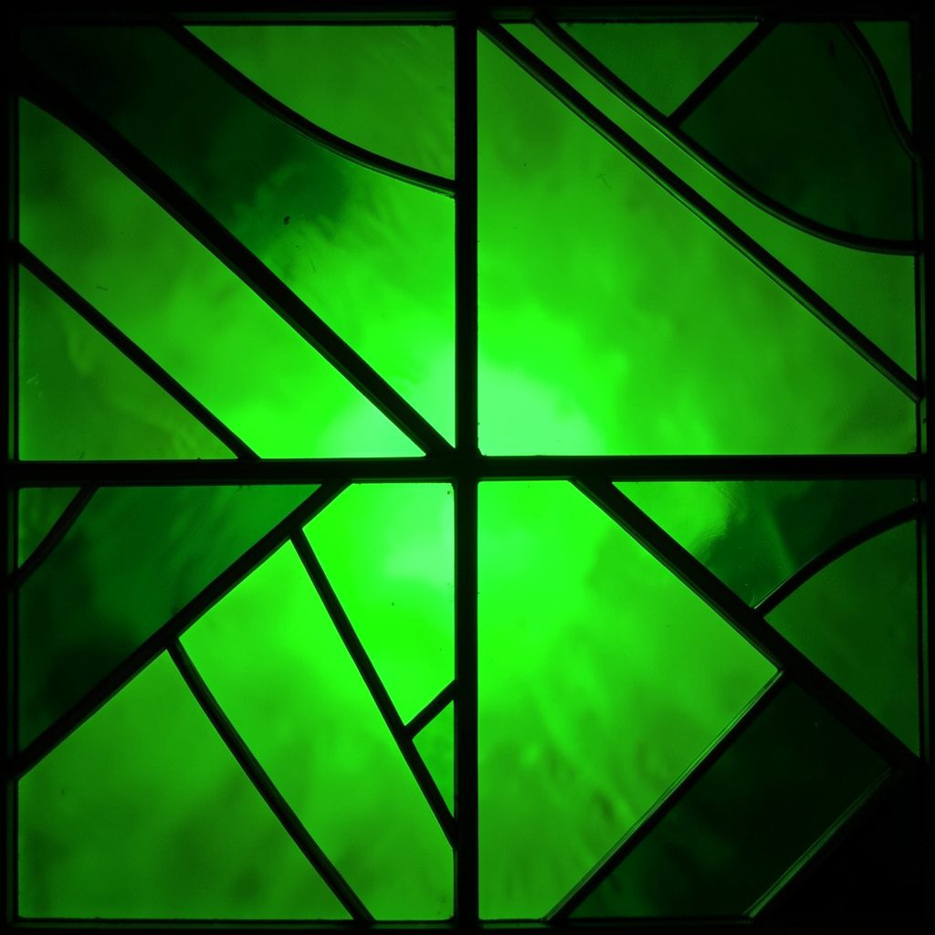 A moody composition of overlapping translucent geometric shapes in deep green and soft blush pink, resembling stained-glass panels with bold leaded segments and a warm, inviting glow.